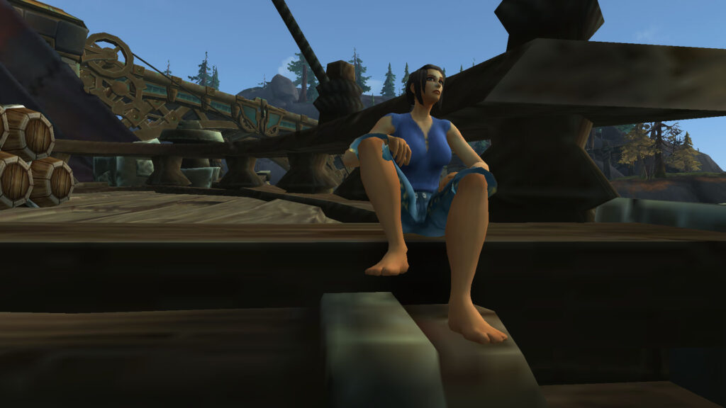 WoW girl sitting on a ship